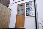 European oak boarded door with glazed upper