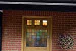 European oak front door with raised panels and stained glass double glazed units
