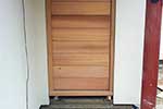 Horizontally boarded western red cedar pivot door