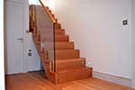 American white oak contemporary cut string staircase with frameless glass balstraude