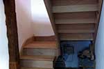 American white oak quarter landing staircase with curtail first tread to take monkey tail and continous handrail