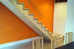 Birch plywood cut string staircase with planted tread and riser pieces