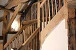 Rustic European oak housed string staircase elevation
