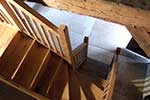 Rustic European oak housed string staircase